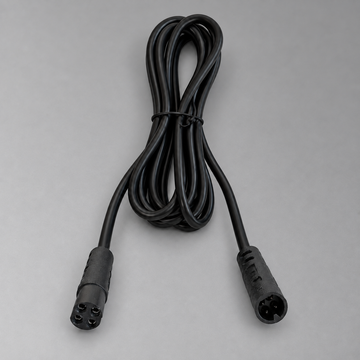 Black BLAQ IRIS extension cable shown coiled with its plug and socket connectors