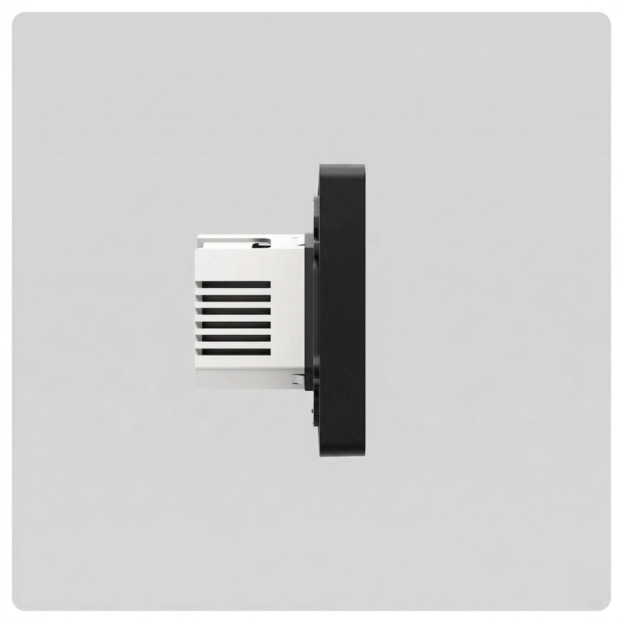 Rear side view of HALO Smart Switch black wall plate with the white vented mounting block