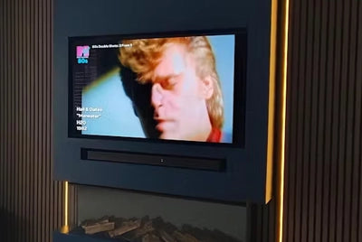 blaq aura slat wall each side of tv.webp__PID:4237363e-a109-4d68-8d39-378284a40063