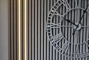 blaq aura slat wall with clock.webp__PID:24b632ee-c761-4407-a24f-42fadbdf34a0