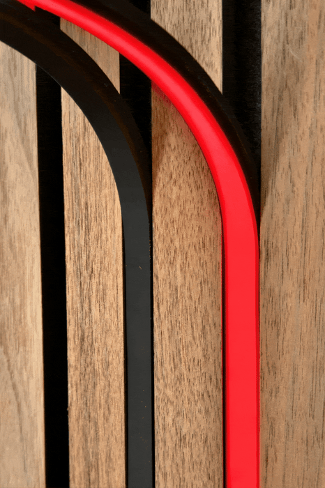 Animated BLAQ IRIS LED strip cycling through colours between timber wall slats
