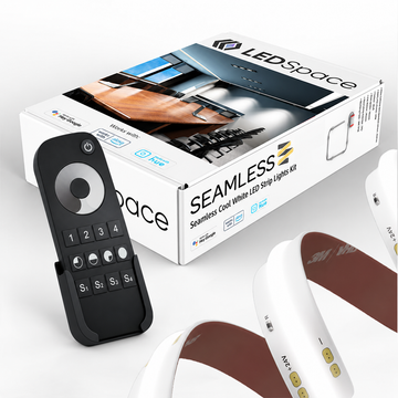 Seamless cool white LED strip pack with LEDSpace box and black four-zone dimming remote in its wall cradle