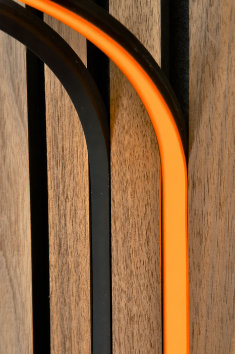 BLAQ IRIS slat-wall LED strip showing orange light between timber slats