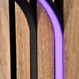 BLAQ IRIS slat-wall LED strip showing purple light between timber slats