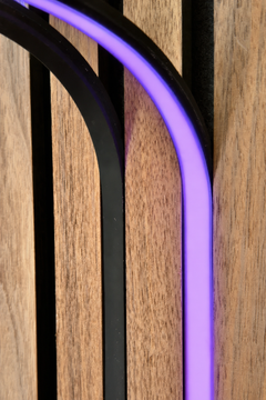 BLAQ IRIS slat-wall LED strip showing purple light between timber slats