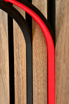 BLAQ IRIS slat-wall LED strip showing red light between timber slats