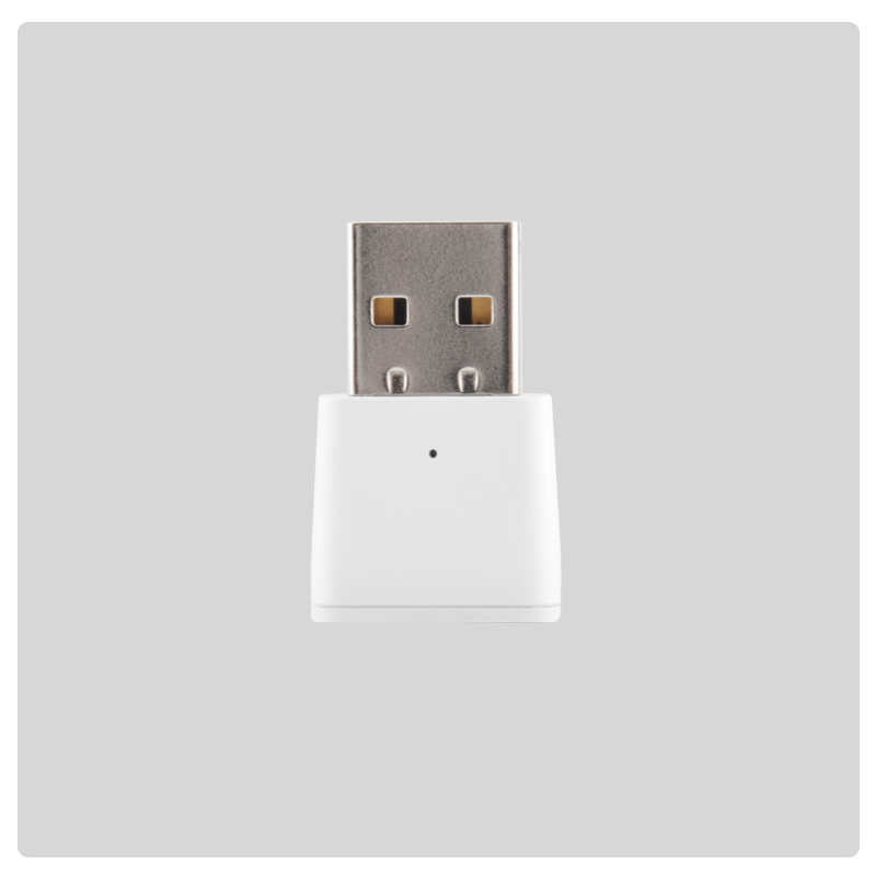 HALO Zigbee range extender USB dongle shown on a grey background from a different angle