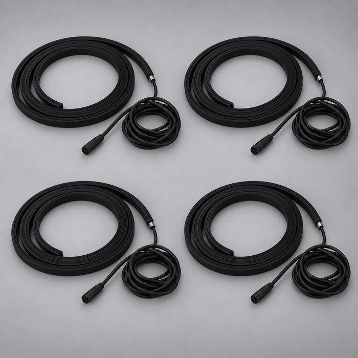 Four unlit black BLAQ IRIS LED strips shown coiled with their connection leads