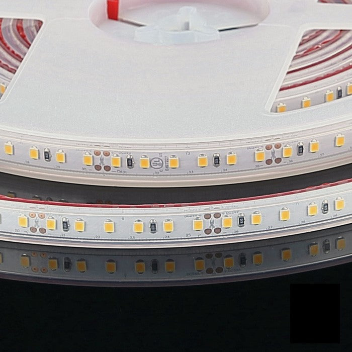 Close-up of coiled LED tape showing LED chips and its clear protective covering